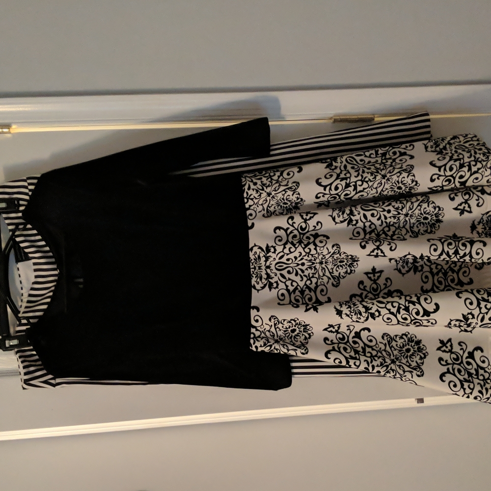 Really cute velvet dress first a medium to large.